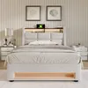 A bedroom scene with a bed, nightstands, and wall decor. Náhled obrázku produktu