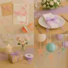 A collage of images showcasing decorative ribbons, cards, flowers, and lanterns, likely for events or crafts. Produktbild-Vorschau