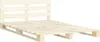 A wooden pallet bed frame with a headboard, shown against a white background. Náhľad obrázku produktu