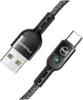 A close-up studio shot of a black USB-C charging cable with a braided cord. Anteprima dell’immagine prodotto