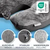 A close-up view of a gray travel neck pillow with three circular insets highlighting its features. Produktbild-Vorschau