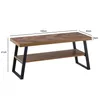 A product shot of a wooden coffee table with black metal legs, showing dimensions. Voir les images du produit