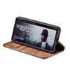 A smartphone in a brown flip case, displaying a movie poster on its screen. Produktbild-Vorschau