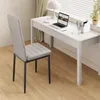 A chair and desk setup in a room with blinds and curtains. Náhľad obrázku produktu