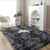 A cozy living room scene with a shaggy rug, rocking chair, and bookshelf. Náhled obrázku produktu