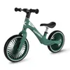 A green balance bike is shown against a white background. Voir les images du produit