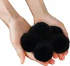 Hands holding black filter balls. Náhľad obrázku produktu