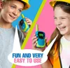 Two children wearing hard hats are holding and looking at walkie-talkies, with a colorful background and a speech bubble containing text. Produktbild-Vorschau