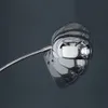 A close-up shot of a chrome floor lamp with a reflective surface, set against a dark gray background. Produktbild-Vorschau