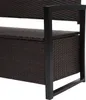 Close-up of a brown poly-rattan bench with black metal legs. Podgląd zdjęcia produktu