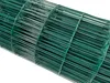 A roll of green wire mesh fencing. Produktbild-Vorschau