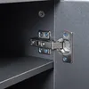 A close-up view of a cabinet hinge and shelf inside a piece of furniture. Produktbild-Vorschau