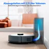 A robot vacuum cleaner is shown docking with its charging and dust-emptying station, with blue light effects indicating the suction process. The background depicts a blurred interior scene of a living room. Produktbild-Vorschau