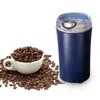 A coffee grinder and a cup of coffee beans on a white background. Produktbild-Vorschau