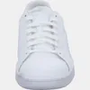 A front view of a white Puma Smash V2 L sneaker. Produktbild-Vorschau