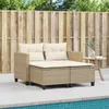 A beige poly rattan sofa with cream cushions is placed on a light gray tiled patio next to a swimming pool, with a wooden fence in the background. Produktbild-Vorschau