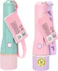 Two children's flashlights, one pink and one green, are shown side-by-side against a white background. Both have attached tags with product information. Voir les images du produit