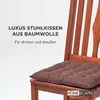 A brown chair cushion on a wooden chair, with text overlay. Anteprima dell’immagine prodotto