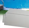 A close-up view of metal garden edging pieces stacked in front of a swimming pool. Produktbild-Vorschau