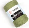 A roll of green macrame cotton yarn. Podgląd zdjęcia produktu