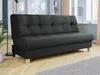 A dark gray sofa bed is shown in a living room setting with a window and curtains in the background. Náhľad obrázku produktu