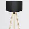 A close-up shot of a black lampshade on a wooden tripod stand against a white background. Anteprima dell’immagine prodotto