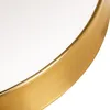 A close-up view of the edge of a round object with a white surface and a gold metallic rim. Produktbild-Vorschau
