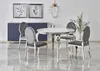 A dining set with a round table and chairs in a modern dining room. Voir les images du produit