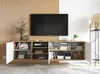A modern TV stand with open shelves and two doors, displaying various items on and within it, set against a slatted wooden wall. Náhľad obrázku produktu