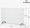 A white glass electric heater with silver legs, shown on a white background with dimensions indicated by lines and text. Náhľad obrázku produktu
