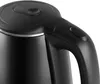 A close-up view of the handle and lid of a black electric kettle. Náhled obrázku produktu