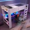 A white loft bed with a desk and gaming setup underneath, illuminated by blue LED lights. Náhled obrázku produktu