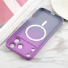 The back of a phone case with a MagSafe ring, placed on a marble surface next to some books. Produktbild-Vorschau