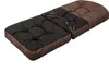 A tufted cushion with brown edges and a black patterned center, lying on a white background. Náhled obrázku produktu