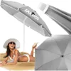 A woman is lying on the sand under a beach umbrella. The image is a collage of different views of the umbrella and the woman. Náhled obrázku produktu