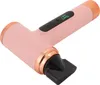 A pink cordless hair dryer with rose gold accents and a black nozzle is shown against a white background. Podgląd zdjęcia produktu
