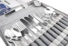 A set of cutlery and a cutting board laid out in a grey carrying case. Anteprima dell’immagine prodotto