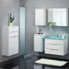 A modern bathroom with white cabinets, a sink with a green glass countertop, and a cactus plant. Produktbild-Vorschau