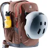 A brown Deuter backpack with a yellow water bottle and a gray helmet attached. Náhľad obrázku produktu