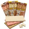 Three packages of dog treats designed to look like chocolate bars, with three actual dog treats in the foreground. Produktbild-Vorschau