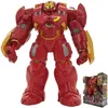 A large red and gold Hulk Buster action figure is displayed against a white background. A smaller image of the product in its packaging is visible in the lower right corner. Anteprima dell’immagine prodotto