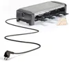 A raclette grill with a stone top and a power cord on a white background. Produktbild-Vorschau