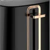 A close-up view of a black toaster with gold accents. Produktbild-Vorschau