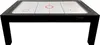 A black air hockey table with a white playing surface and red and blue markings, shown from a front-facing, slightly elevated angle. Anteprima dell’immagine prodotto