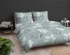 A bed with floral patterned bedding in a bedroom setting. Produktbild-Vorschau