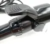 Close-up of the handle and controls of a black curling iron. Anteprima dell’immagine prodotto