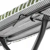 Close-up view of the underside of an ironing board, showing its metal frame and a portion of the patterned cover. Produktbild-Vorschau