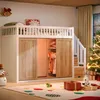A child's loft bed with a built-in wardrobe, decorated for Christmas. Voir les images du produit
