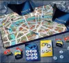 A board game laid out on a stone-like surface, with game pieces and cards. Produktbild-Vorschau