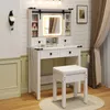 A white vanity table with a lighted mirror and a matching stool in a room with white shiplap walls. Voir les images du produit